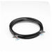 Black cable with a white label on a white background